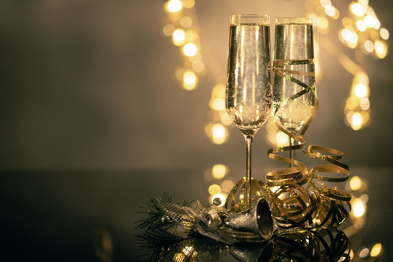 New Year's Eve Party Lighting Ideas Two Filled Champagne Glasses Sitting on a Table